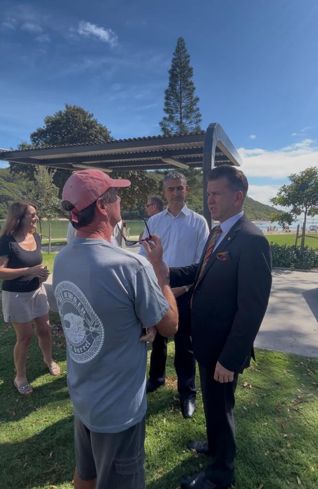 Ian Read speaking to the deputy premier Jarrod Bleijie after the press conference about community consultation for Light Rail Stage 4