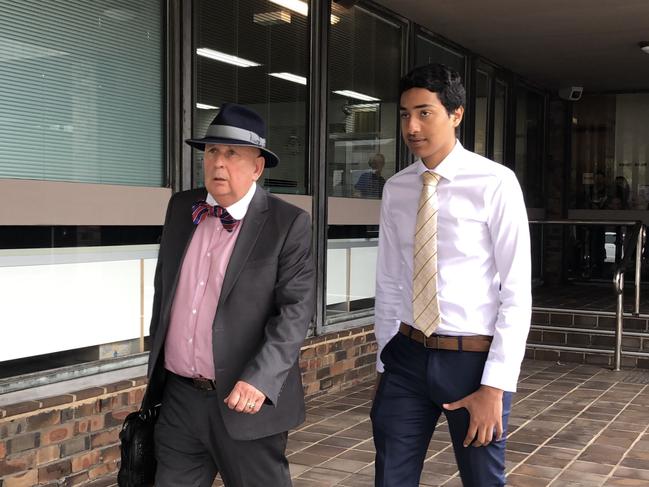 Abdullah Hakami (right) leaves court with his lawyer. Picture: Madeline Crittenden.