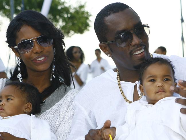 EAST HAMPTON, NY - SEPTEMBER 02:  Host Sean "Diddy" Combs and Kim Porter with their twin daughters D'Lila Star Combs and Jessie James Combs pictured at "The Real White Party" presented by Sean "Diddy" Combs at the Combs' East Hampton estate on September 2, 2007 in East Hampton, New York.  (Photo by Mat Szwajkos/CP/Getty Images for CP)