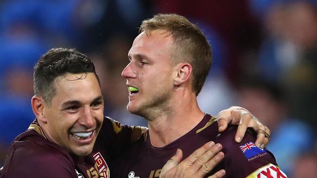 BRISBANE, AUSTRALIA - JULY 11: Daly Cherry-Evans of Queensland is congratulated by Billy Slater after scoring a try during game three of the State of Origin series between the Queensland Maroons and the New South Wales Blues at Suncorp Stadium on July 11, 2018 in Brisbane, Australia. (Photo by Cameron Spencer/Getty Images)