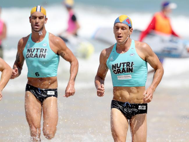 Ali Day leads Matt Poole out of the water at Coolum Beach in NSW in November. Picture: Shane Myers ©2018 Ocean6