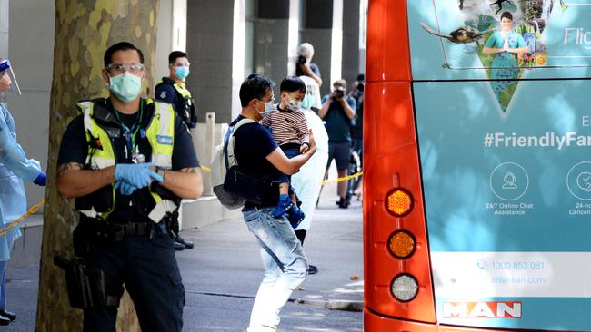 Quarantined international travellers board a coach to the Pullman hotel at Albert Park in Melbourne. Picture: NCA NewsWire / Andrew Henshaw