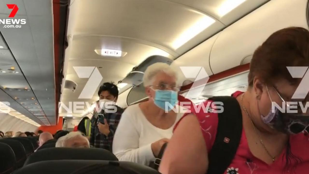 Queensland travel Wild scenes as passengers flee Jetstar flight