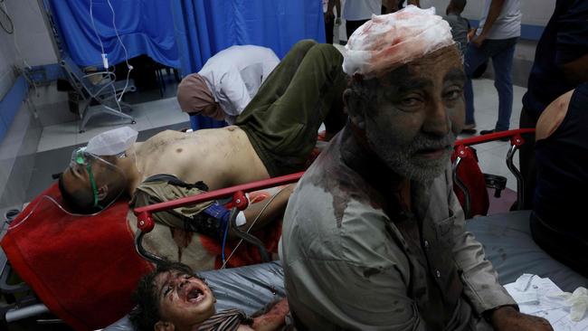 Wounded Palestinians wait for treatment at the overcrowded emergency ward of Al-Shifa hospital in Gaza City. Picture: AFP