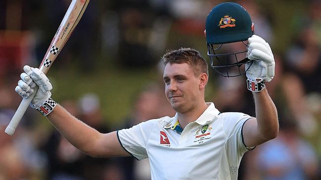 Australia's Cameron Green celebrates 100 runs during day one of the 1st International cricket Test match between New Zealand and Australia at the Basin Reserve in Wellington on February 29, 2024. (Photo by Marty MELVILLE / AFP)