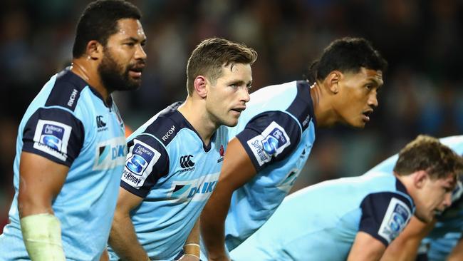 SYDNEY, AUSTRALIA - JULY 09: Bernard Foley of the Waratahs and team mates look on after a Hurricanes try during the round 16 Super Rugby match between the Waratahs and the Hurricanes at Allianz Stadium on July 9, 2016 in Sydney, Australia. (Photo by Cameron Spencer/Getty Images)