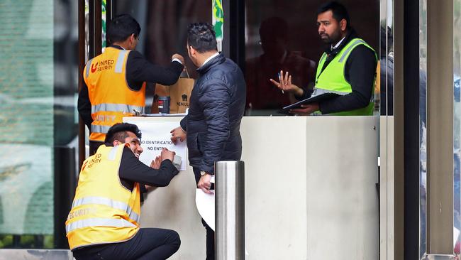 United Security guards stationed at the doors outside quarantine hotel Crown Promenade, in Melbourne’s Southbank. Picture: Aaron Francis