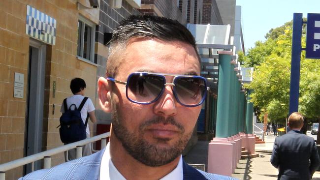 Former Auburn Deputy Mayor Salim Mehajer leaves the Burwood Local Court in Sydney, Thursday, December 14, 2017. (AAP Image/Ben Rushton) NO ARCHIVING