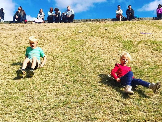 Sliding down the hill at the Mount Lofty Botanic Garden