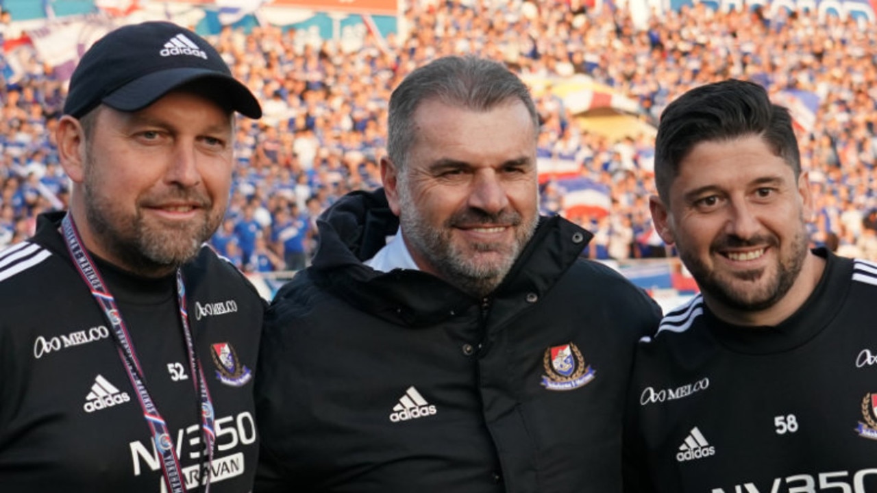 Ange Postecoglou (C) with Aussie assistant coaches Peter Cklamoski (L) and Arthur Papas (R)