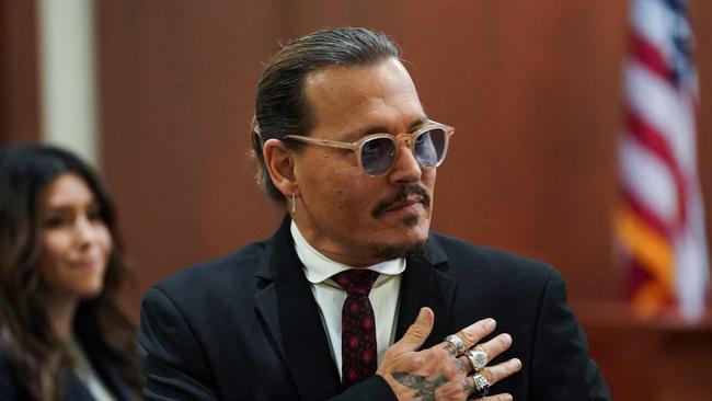 Johnny Depp acknowledges supporters, during a break in his defamation trial against his ex-wife Amber Heard. Picture: AFP