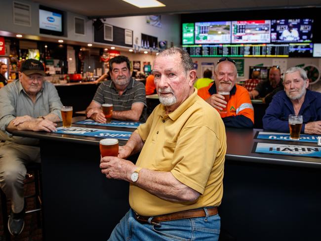 Ian Foot, Allen Wright, Charlie Horgan (yellow), Buzz and Neil Jones in the front bar at the Clovercrest Hotel on October 15, 2020 in Modbury North. The Clovercrest is one of the top five pubs for West End Draught sales in Adelaide. Picture Matt Turner. Contact GM Mick Rogers for any comments 0419 825 839 (they wonÃt hear their phones)