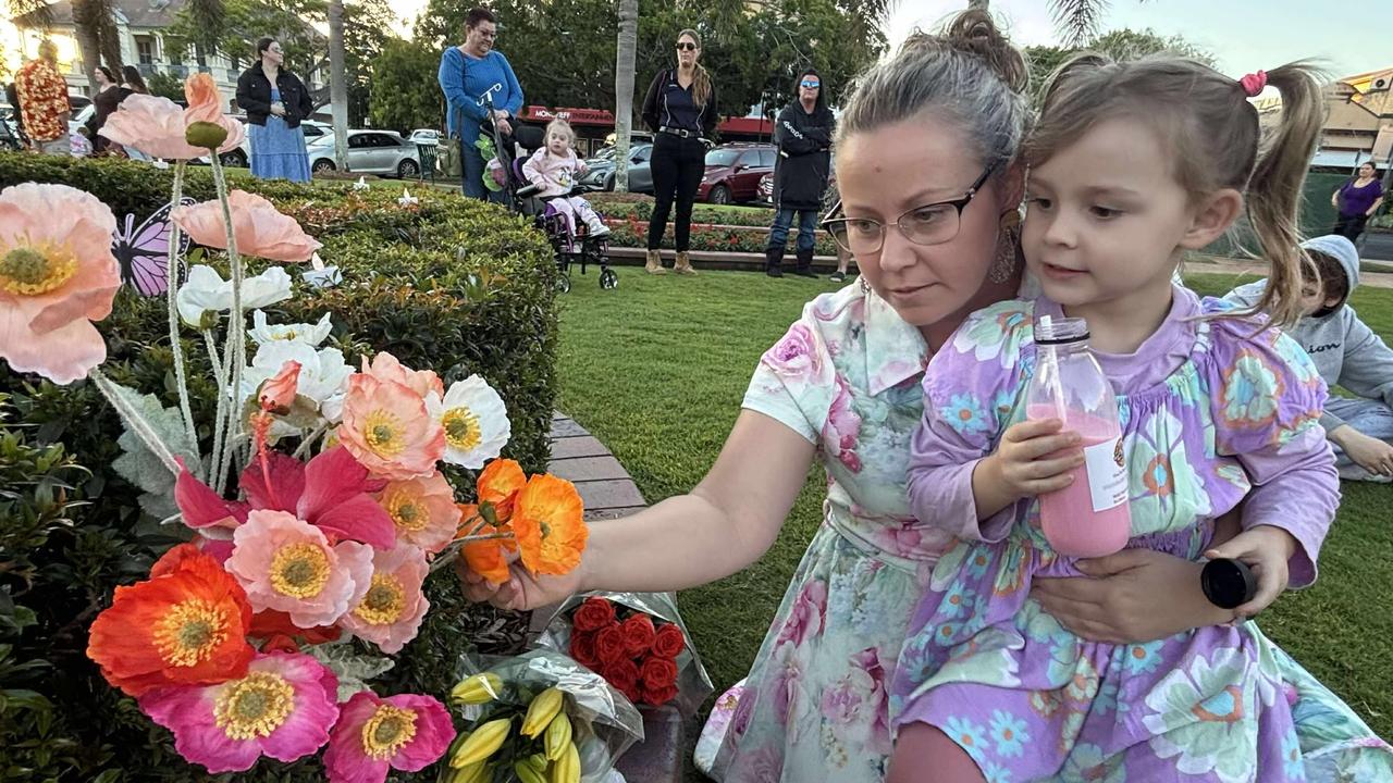 Sarah Lester and Marley, 4, at a vigil for alleged murder victim, Pheobe Bishop in Bundaberg on Monday, June 9, 2025. Photo: Carlie Walker