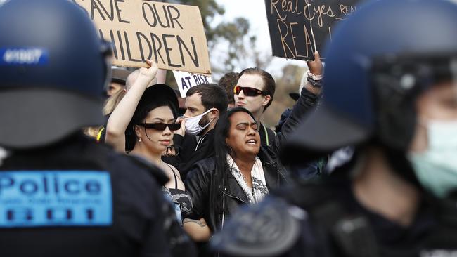 Police contain protesters at Albert Park Lake in Melbourne last Saturday. Picture: NCA NewsWire / Daniel Pockett