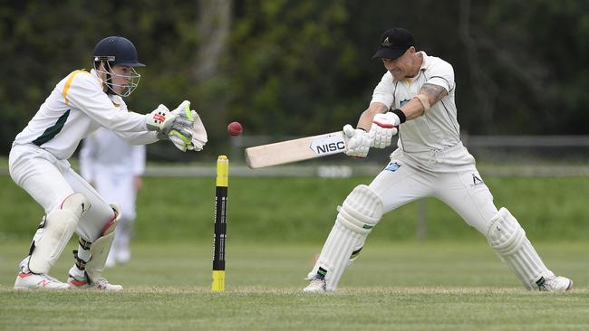 Keeper Liam Johns and Justin Whitcher in action.