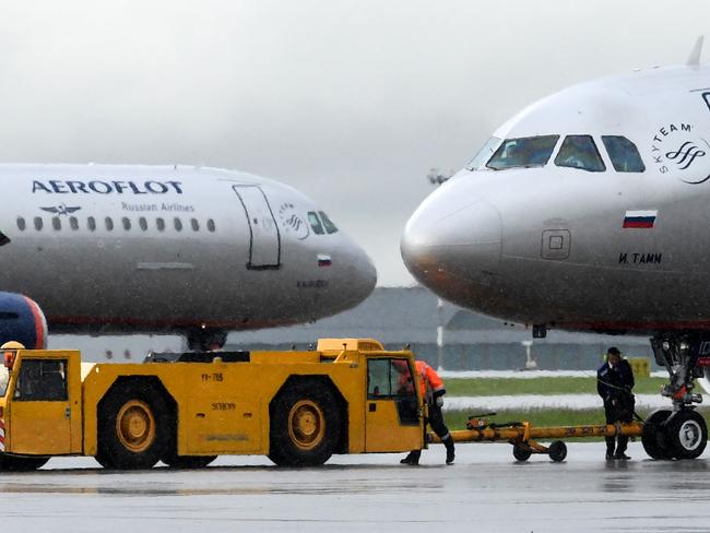 (FILES) In this file photo taken on June 14, 2017 an Aeroflot's aircraft taxis at Moscow's Sheremetyevo international airport. - Airplanes owned by Russian billionaire Roman Abramovich and state carrier Aeroflot among others have violated US sanctions imposed on Moscow over its invasion of Ukraine, Washington said March 18, 2022. (Photo by Kirill KUDRYAVTSEV / AFP)