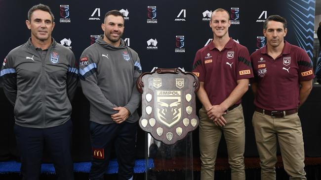 Blues coach Brad Fittler, captain James Tedesco, Queensand skipper Daly Cherry-Evans and a not-amused Queensland coach Billy Slater. Picture: Mark Brake/Getty Images