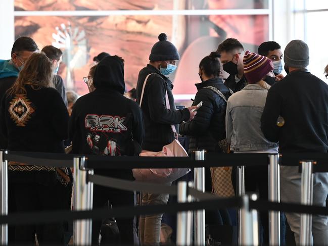 ADELAIDE, AUSTRALIA - NewsWire Photos JUNE 28, 2021:  Passengers who arrived on a flight from Brisbane with to be processed at Adelaide Airport as restrictions around Australia are enforced. Picture: NCA NewsWire / Naomi Jellicoe