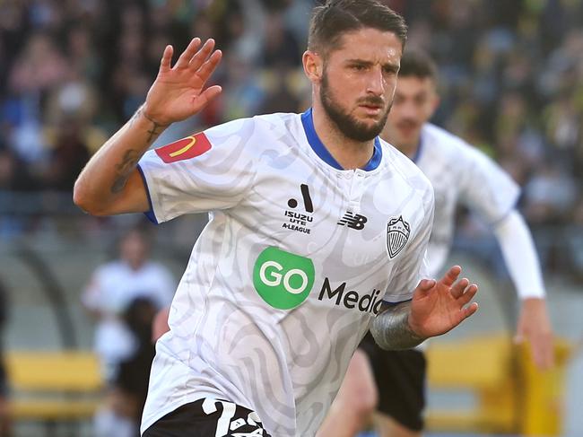 WELLINGTON, NEW ZEALAND - NOVEMBER 02: Jake Brimmer of Auckland FC celebrates after scoring a goal during the round three A-League Men match between Wellington Phoenix and Auckland FC at Sky Stadium, on November 02, 2024, in Wellington, New Zealand. (Photo by Phil Walter/Getty Images)