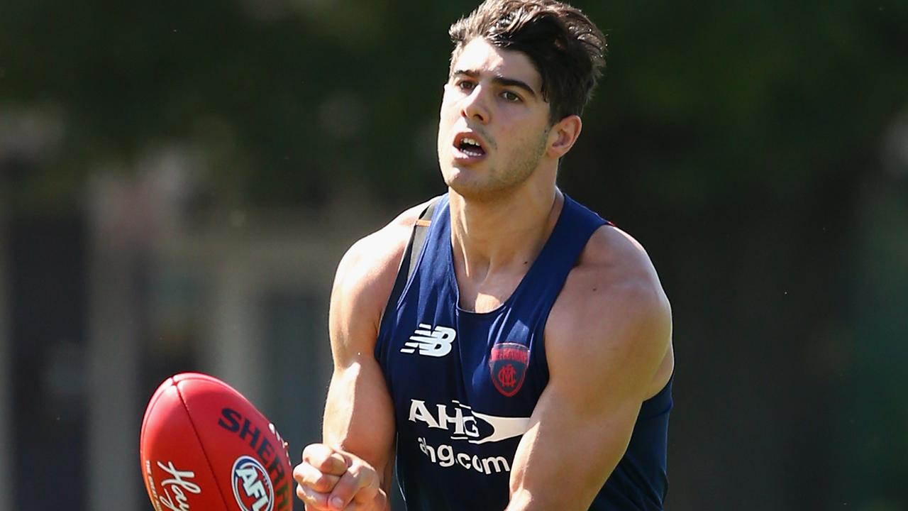 MELBOURNE, AUSTRALIA - DECEMBER 18: Christian Petracca of the Demons handballs during a Melbourne Demons AFL pre-season training session at Gosch's Paddock on December 18, 2015 in Melbourne, Australia. (Photo by Quinn Rooney/Getty Images)