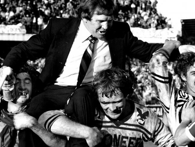 Max Krillich (left) and Bob Fulton chair coach Frank Stanton after beating the Eels in 1976.