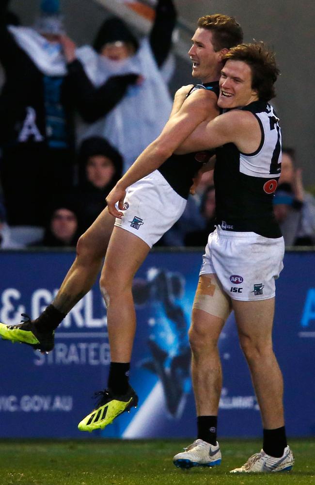 Kane Farrell and Jared Polec of the Power celebrate a goal during the round 19 match against the Bulldogs. Picture: Darrian Traynor/Getty Images