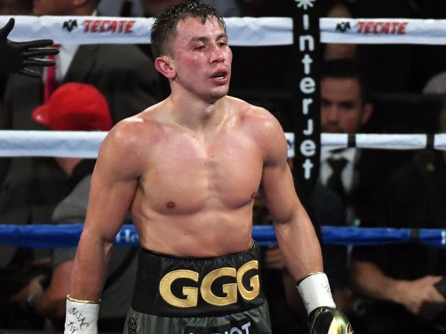 LAS VEGAS, NV - SEPTEMBER 16: Gennady Golovkin walks back to his corner after the ninth round of his WBC, WBA and IBF middleweight championship bout against Canelo Alvarez at T-Mobile Arena on September 16, 2017 in Las Vegas, Nevada. The boxers fought to a draw and Golovkin retained his titles.   Ethan Miller/Getty Images/AFP == FOR NEWSPAPERS, INTERNET, TELCOS & TELEVISION USE ONLY ==