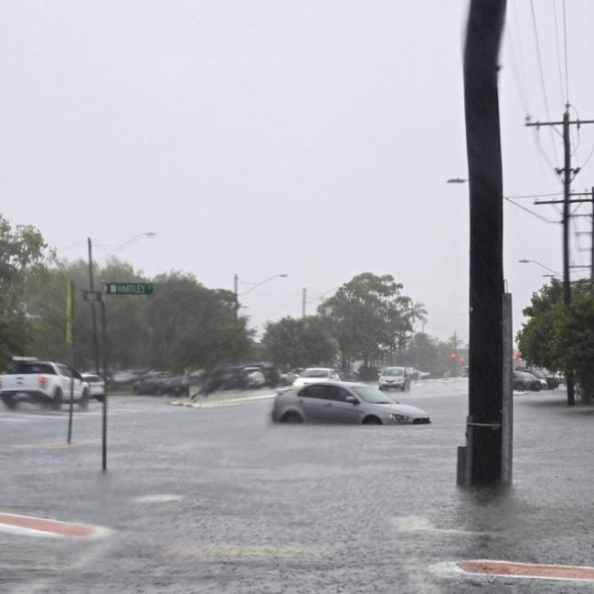 Streets flooded in Cains after up to 100mm of rain. Picture: Michelle Tangye