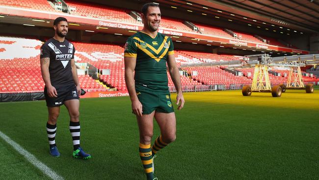 Cameron Smith and Jesse Bromwich walk on to the pitch at Anfield ahead of the Four Nations final.