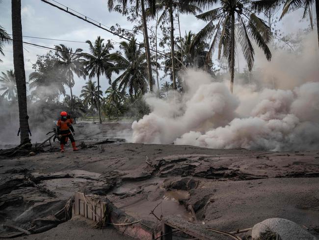 An area is seen covered in volcanic ash after the Semeru volcano eruption that killed at least 14 people. Picture: AFP