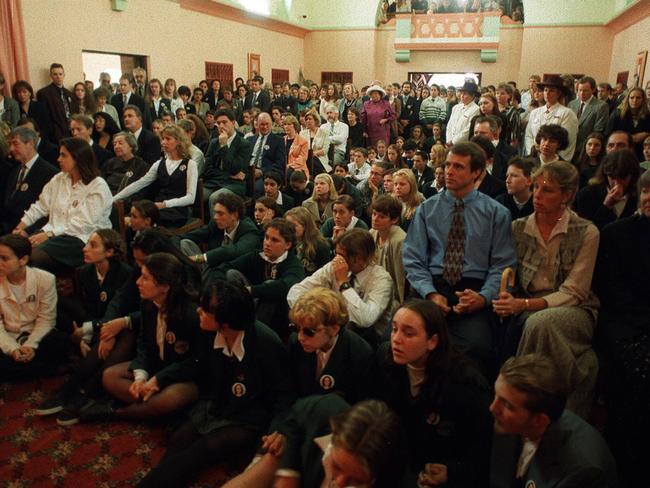 Family, friends and classmates crowd inside the church for Anna Wood’s funeral