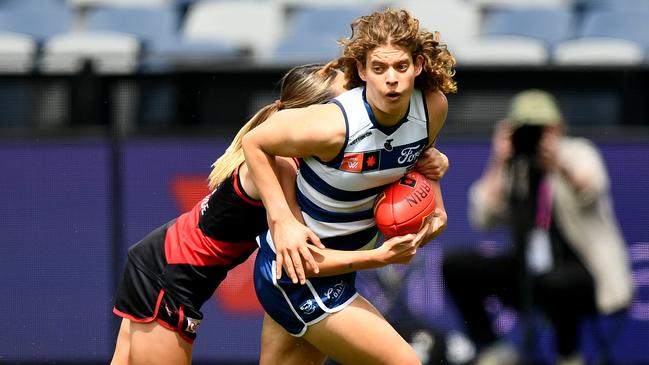 GEELONG, AUSTRALIA – NOVEMBER 12: Nina Morrison of the Cats is tackled by Georgia Gee of the Bombers during the AFLW Second Elimination Final match between Geelong Cats and Essendon Bombers at GMHBA Stadium, on November 12, 2023, in Geelong, Australia. (Photo by Josh Chadwick/Getty Images)