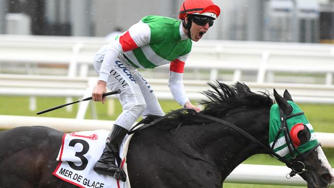 Damian Lane and Mer De Glace charge to victory the Caulfield Cup.