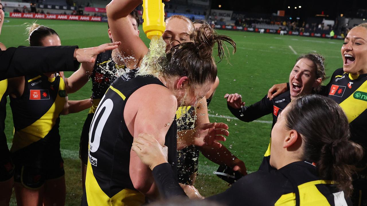 Tamara Luke was mobbed by Richmond teammates after a 33-point win over Carlton in her debut for her third AFLW club. Picture: Daniel Pockett / Getty Images