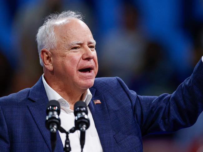 Minnesota Governor and Democratic vice presidential candidate Tim Walz speaks at a campaign rally in support of Vice President and Democratic presidential candidate Kamala Harris at Alliant Center in Madison, Wisconsin, on October 22, 2024. (Photo by KAMIL KRZACZYNSKI / AFP)