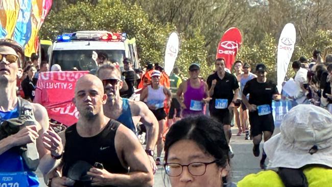 Two Gold Coast Marathon runners have been rushed to hospital after collapsing during the race.