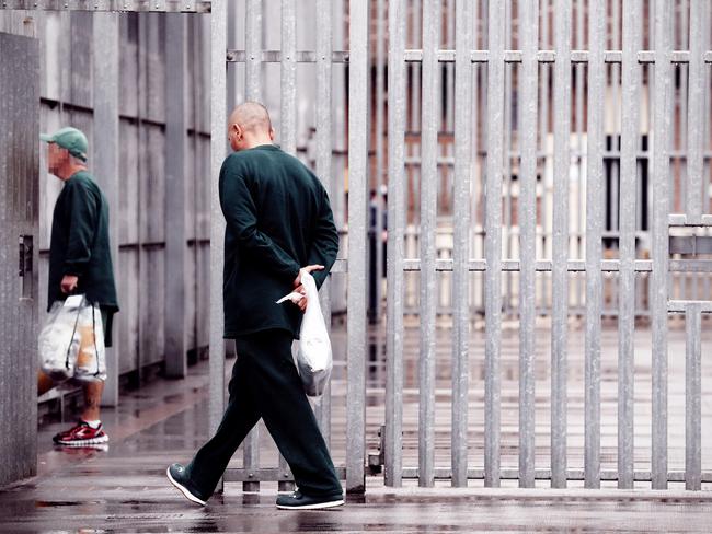 Inmates returning from work.