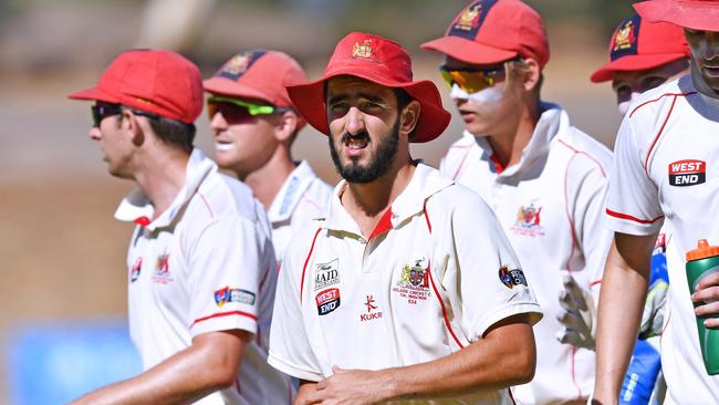 Cam Valente (front) starred in Adelaide’s clash with Southern District on Saturday. Picture: AAP/Mark Brake