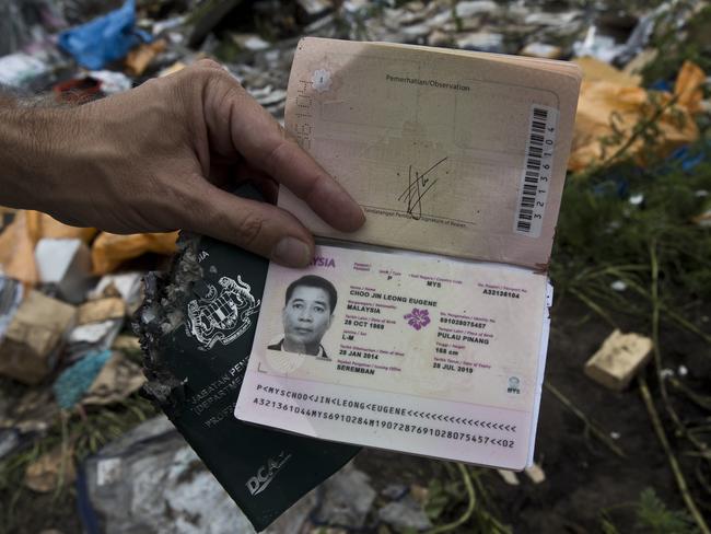 Passport of one of the pilots Captain Choo Jin Leong Eugene, found in a field by News Corp Australia in 2014. Picture: Ella Pellegrini