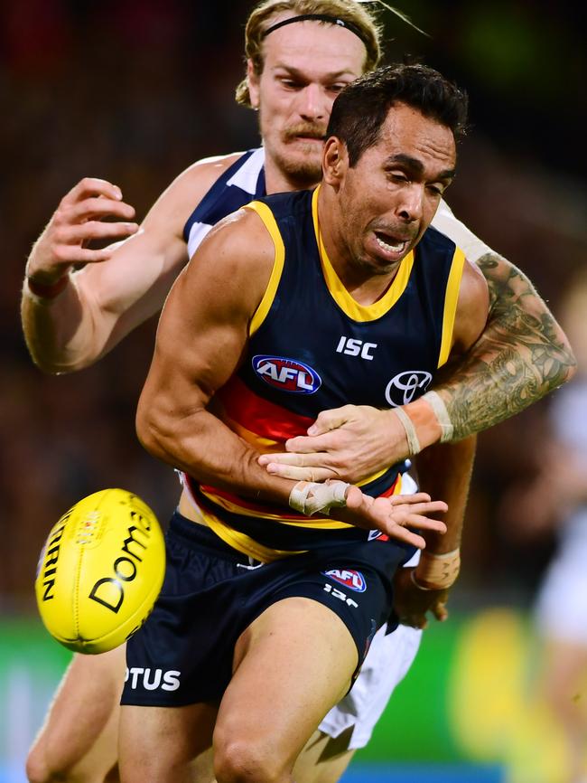 Eddie Betts spills the footy under intense pressure from Geelong’s Tom Stewart on Thursday. Picture: Mark Brake/Getty Images