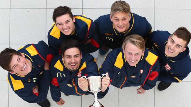 CHAMPIONS: Izak Rankine and Jack Lukosius (holding cup) with SA AFL under-18 division one championship teammates, from left, Hugo Munn, Connor Rozee, Jackson Hately and Luke Valente. Picture: Tait Schmaal.