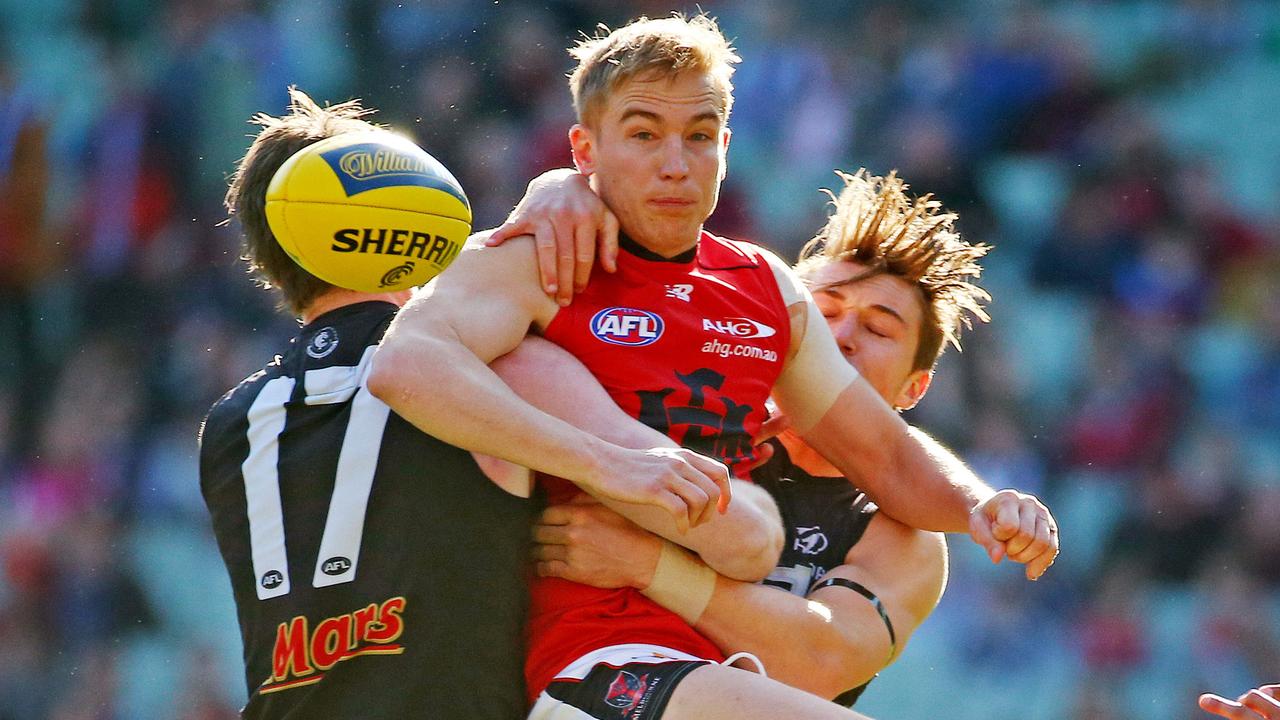 AFL Round 21 - Carlton v Melbourne at MCG, Bernie Vince tackled by Sam Rowe and Patrick Cripps. Melbourne. 23rd August 2015. Picture: Colleen Petch.