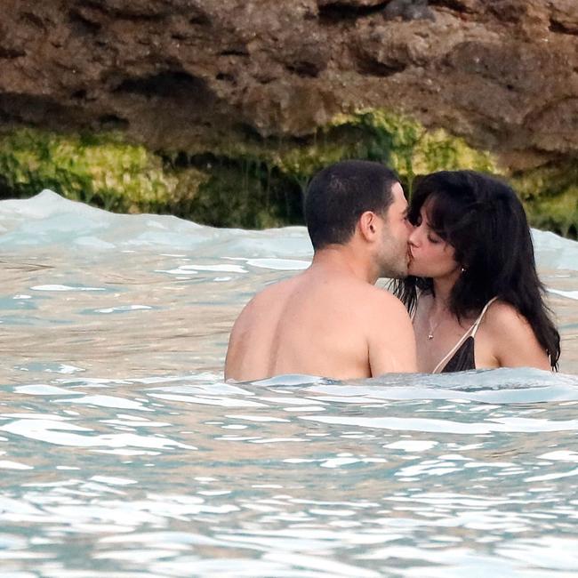 The loved-up couple share a kiss. Picture: Spread Pictures/MEGA