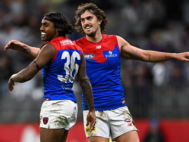 PERTH, AUSTRALIA - JULY 29: Kysaiah Pickett and Luke Jackson of the Demons celebrates a goal during the 2022 AFL Round 20 match between the Fremantle Dockers and the Melbourne Demons at Optus Stadium on July 29, 2022 in Perth, Australia. (Photo by Daniel Carson/AFL Photos via Getty Images)