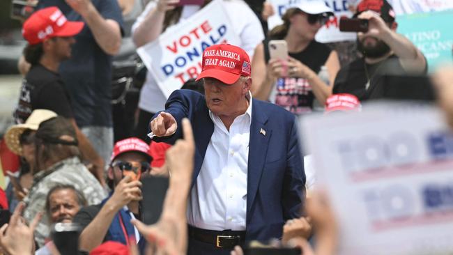 Donald Trump with supporters after speaking during a campaign rally at Sunset Park in Las Vegas, Nevada. Picture: AFP.