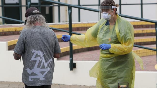 A nurse directs a patient to the mobile coronavirus testing clinic in the Bondi Pavillion. Picture Rohan Kelly