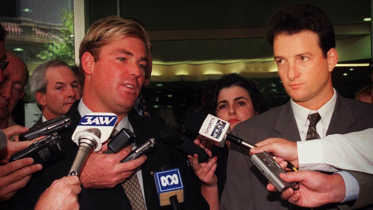 Shane Warne with Mark Waugh speaking to media outside judicial commission into match fixing and bribery.