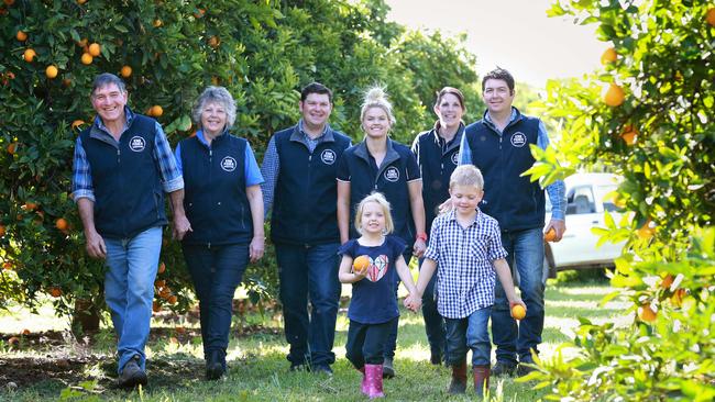 for Farm: Brothers Lynton and Ronan Fisher with thier wives, Mel and Aimee, children, Jack, 2, Campbell, 7 and Tayce, 6 and parents Lex and Glenda run Kingfisher Citrus, a third generation orange farm Picture: ANDY ROGERS