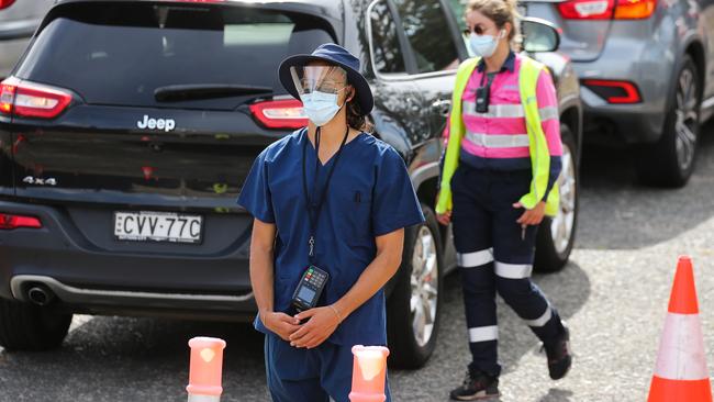 Health professionals are seen working on New Year’s Day at the Bondi Beach, Covid-19 drive thru testing site. Picture: Gaye Gerard