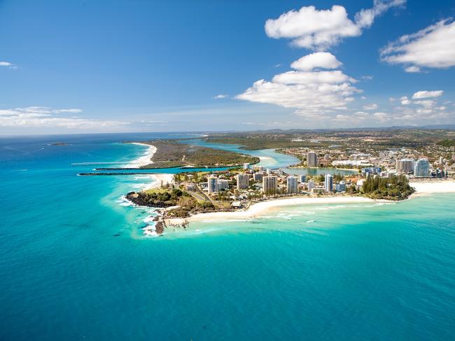 An aerial view of Greenmount Beach and Snapper Rocks at Coolanagatta on Queensland's Gold Coast in Australia on a clear blue water day.2 July 202348hrs - CoolangattaPhoto - iStock